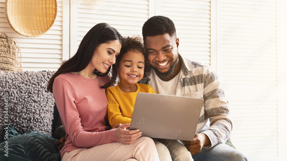 Fototapeta premium Communication on skype. International family with laptop
