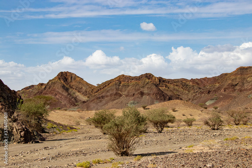 View of mountains around Wadi al Batha at Wadi Bani Khalid near Bidiyya in Oman photo