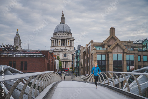 Photography Alone runner in empty streets of london in Coronavirus, Covid-19 quarantine time