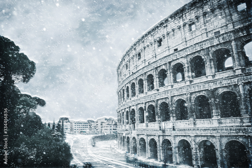 Curving wall of the Colosseum, Rome in snow