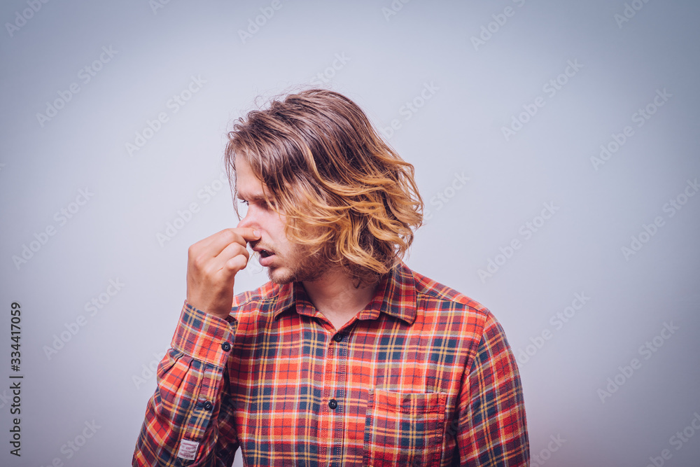 The stench. Closes the man's nose The stench. Closes the man's nose