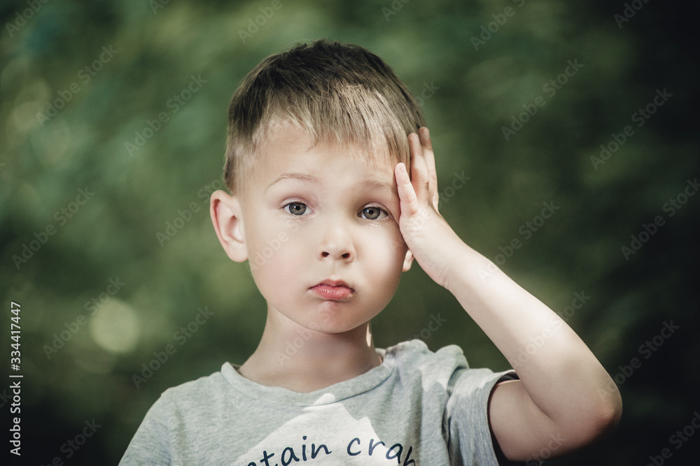 close-up portrait of a little boy with blond hair close-up portrait of a little boy with blond hair