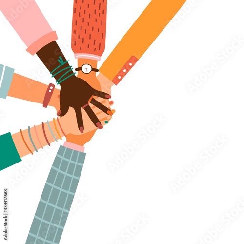 Hands together - set of different races raised up hands.