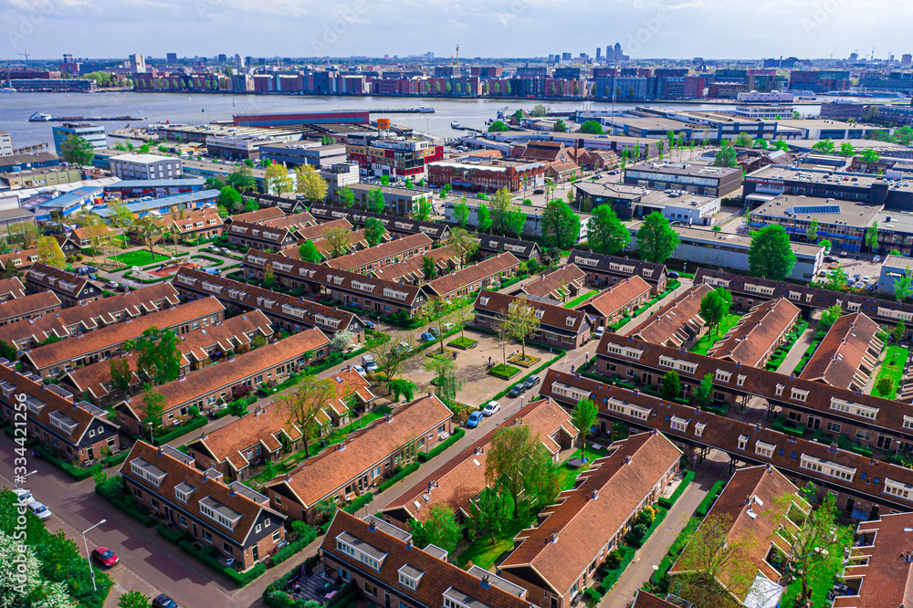 Aerial drone photo of houses in Amsterdam Noord, Netherlands