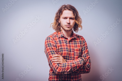 Portrait of a man arms folded