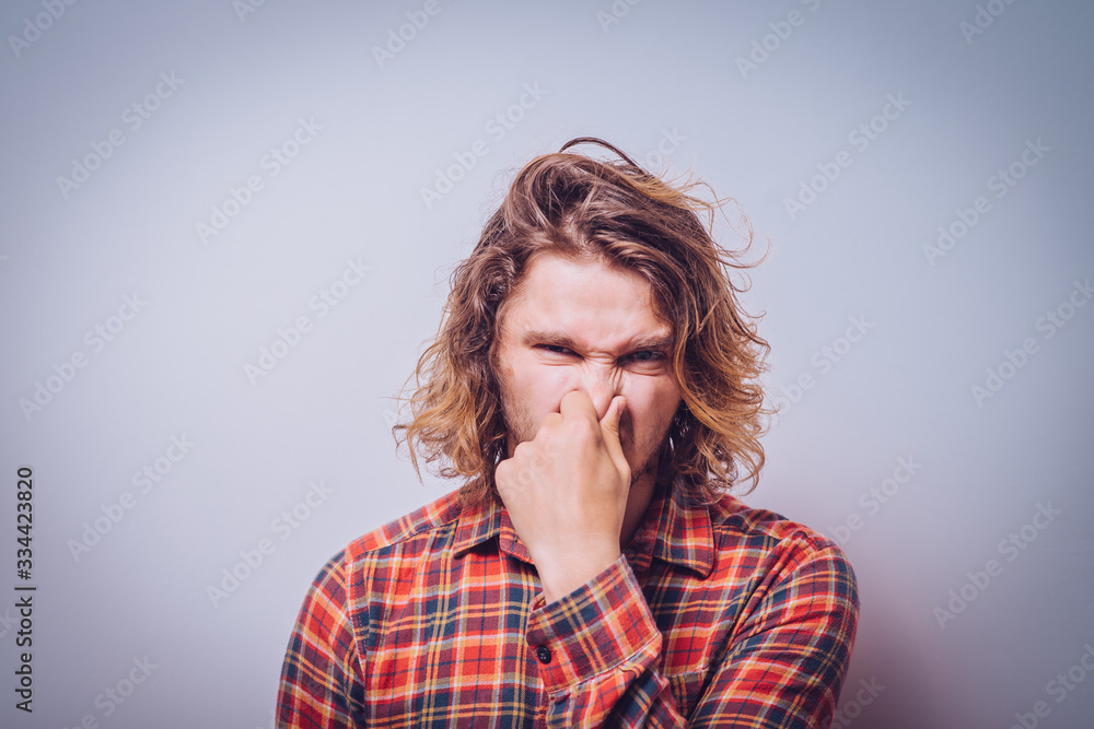 The stench. Closes the man's nose The stench. Closes the man's nose