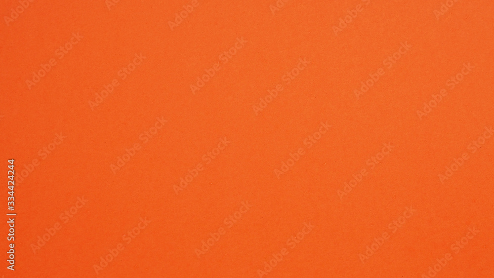 orange paper for background.it is empty space and no people. orange paper for background.it is empty space and no people.