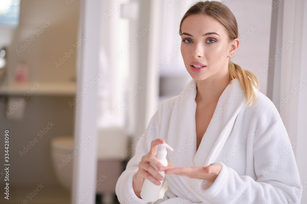 woman resting in a bathrobe at home woman resting in a bathrobe at home