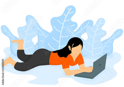 woman using laptop on the floor