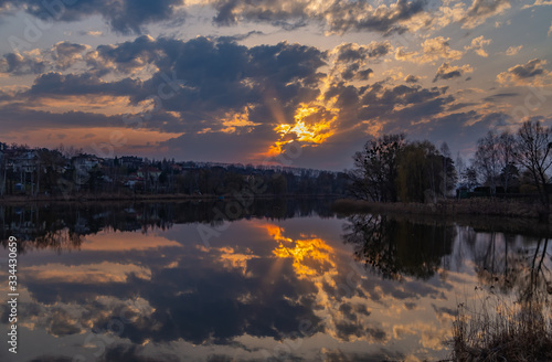 Sunset. Seeing today on the lake in the village of Luka. Kiev region. Ukraine. March 28  2020.