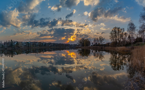 Sunset. Seeing today on the lake in the village of Luka. Kiev region. Ukraine. March 28, 2020.