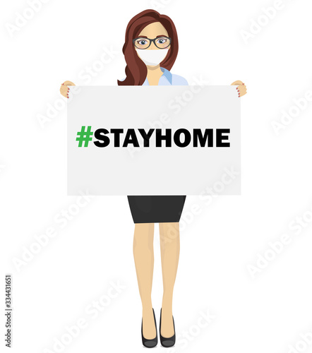 Woman with mask holds a white sheet with text stayhome