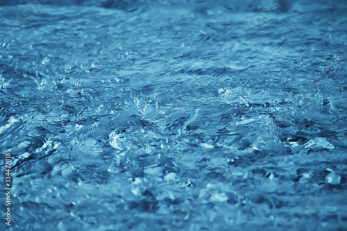 blue background texture water surface flow, abstract water surface © kichigin19