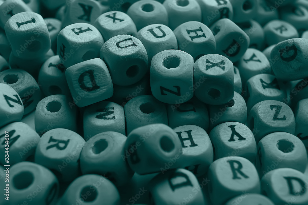 cubes beads letters alphabet / background of wooden cubes with alphabet letters, concept education reading, learning letters cubes beads letters alphabet / background of wooden cubes with alphabet letters, concept education reading, learning letters