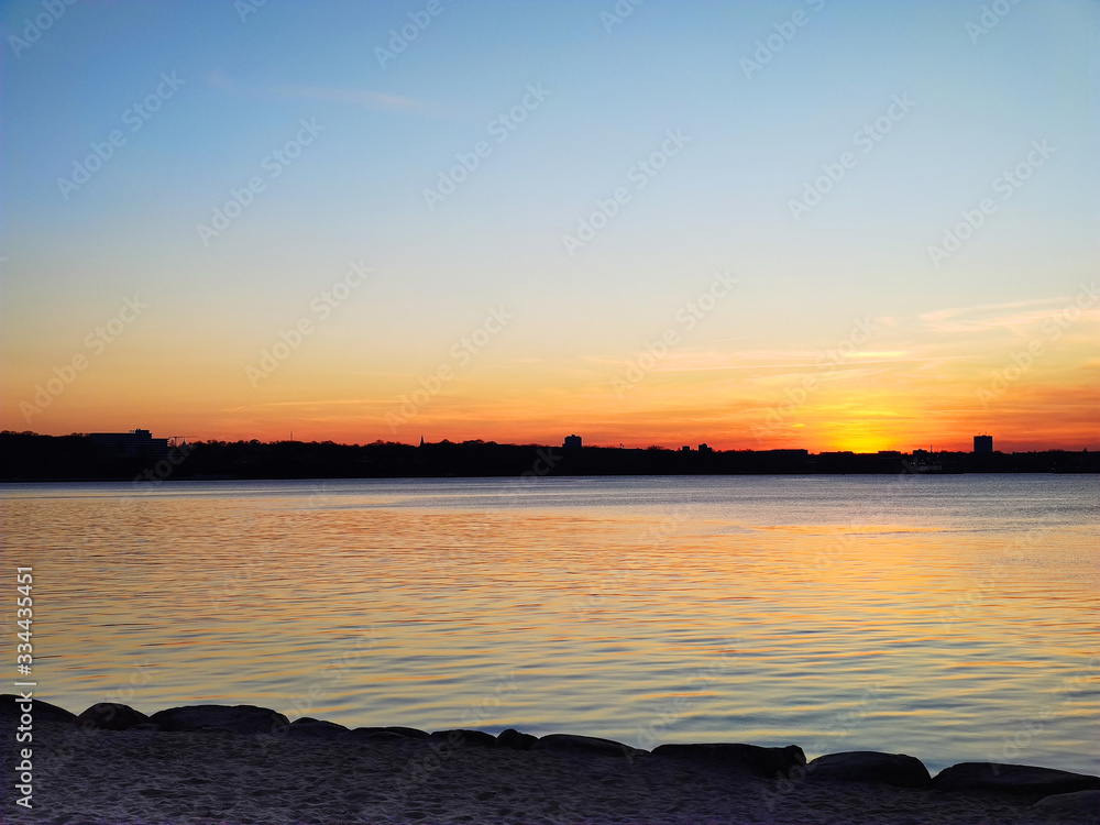 Dramatic sunset on Baltic sea in Germany with pier Dramatic sunset on Baltic sea in Germany with pier