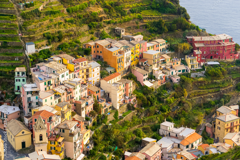 Detail of the curious little town of Manarola, one of the five lands in Liguria, Italy. A small pretty village full of colorfull houses