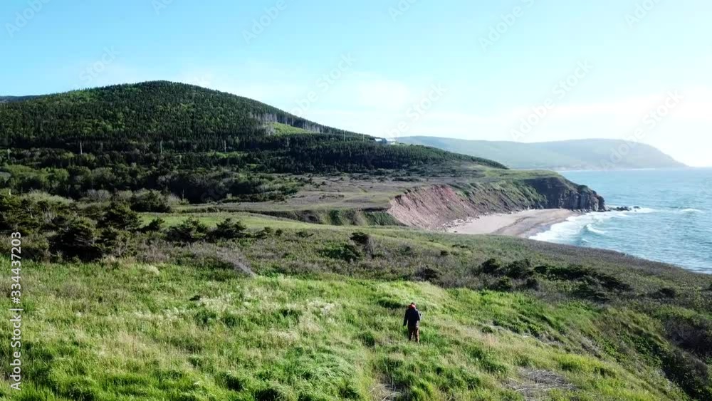 Walking in the grass with amazing ocean coast view - Drone Walking in the grass with amazing ocean coast view - Drone
