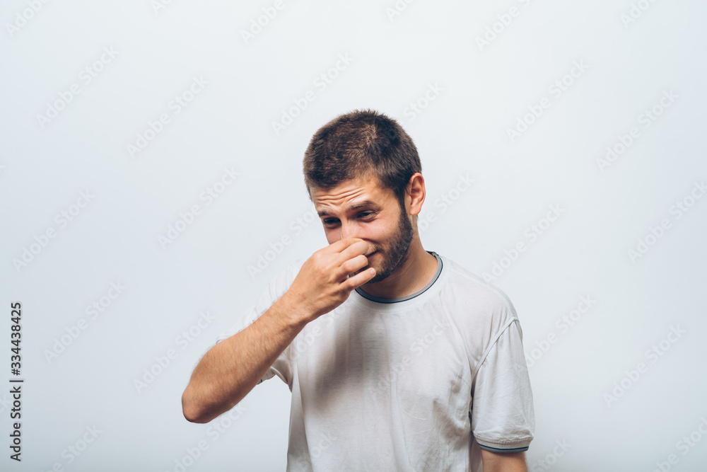 The stench. Closes the man's nose The stench. Closes the man's nose