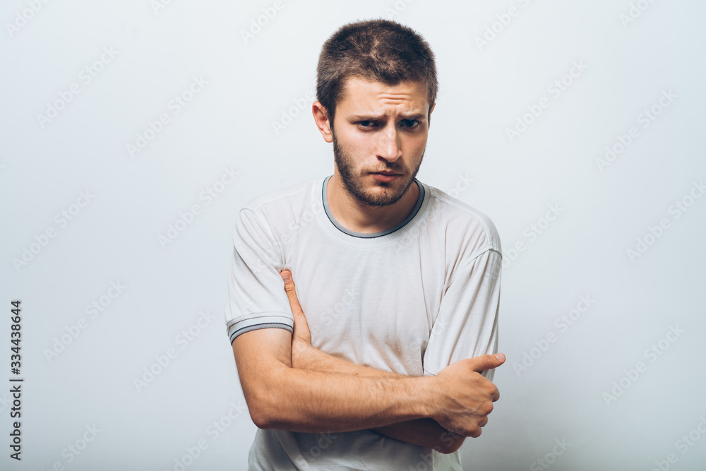 Portrait of a man arms folded Portrait of a man arms folded