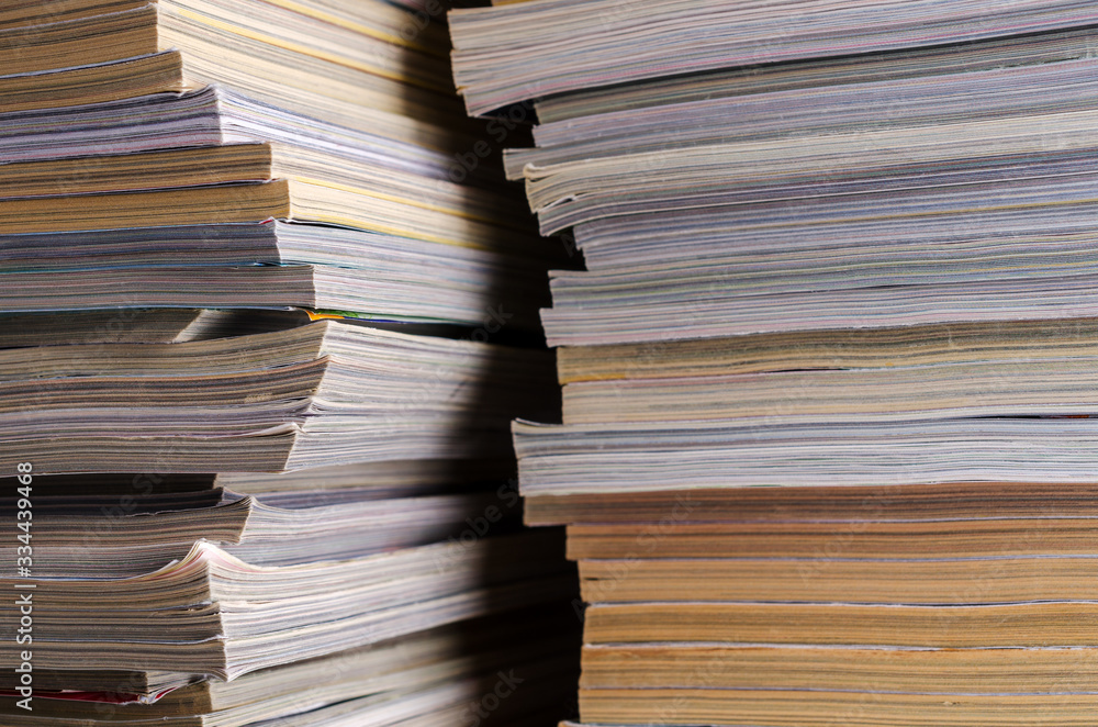 Closeup background of a pile of magazines. Closeup background of a pile of magazines.