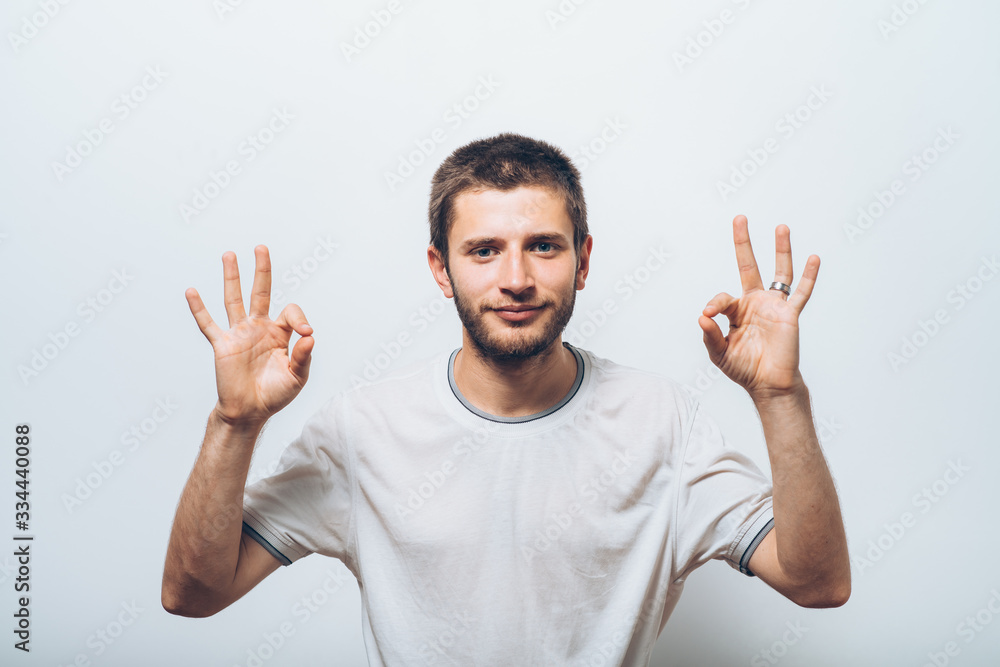 man shows that everything is fine, do not worry. all okay. Gesture. Close portrait. man shows that everything is fine, do not worry. all okay. Gesture. Close portrait.