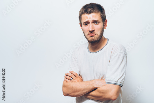 Portrait of a man arms folded