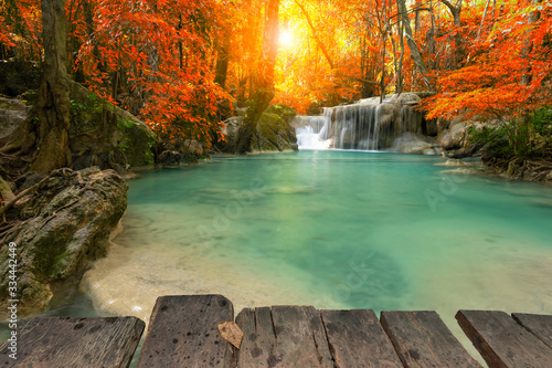 Fototapeta Naklejka Na Ścianę i Meble -  A beautiful waterfall deep in the tropical forest steep mountain adventure in the rainforest.