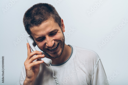 Canvas Print man talking on landline
