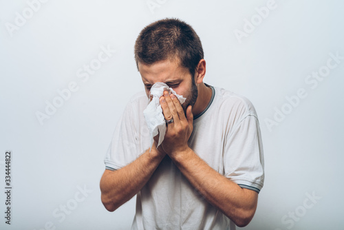 the man has a runny nose photo