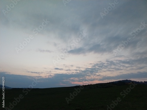 Sunrise or sunset over the hills and meadow. Slovakia