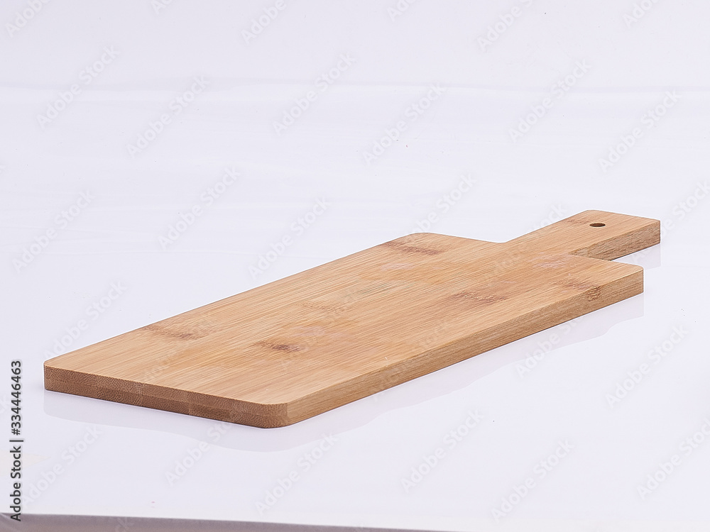 wooden kitchen board on white