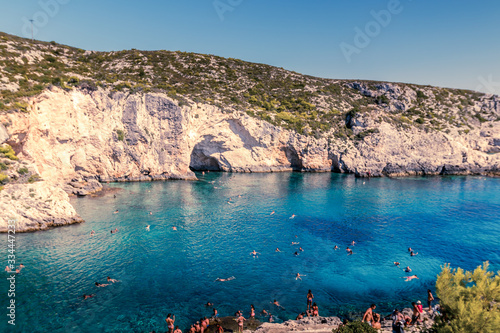 People enjoying themselves on a sunney summers day at Porto Limnionas photo