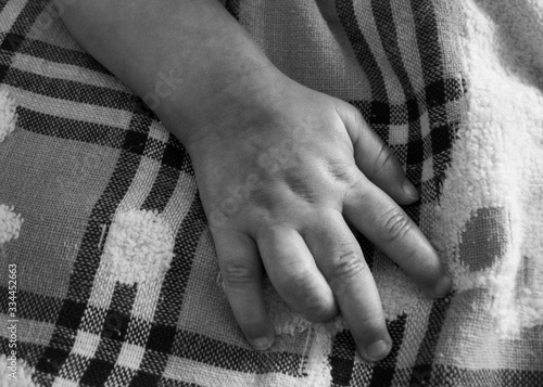 Baby hand, black and white. photo