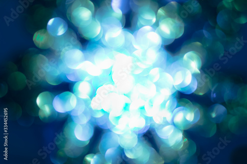 Shimmering blur aqua snowflake background, Christmas concept © YUU-ME