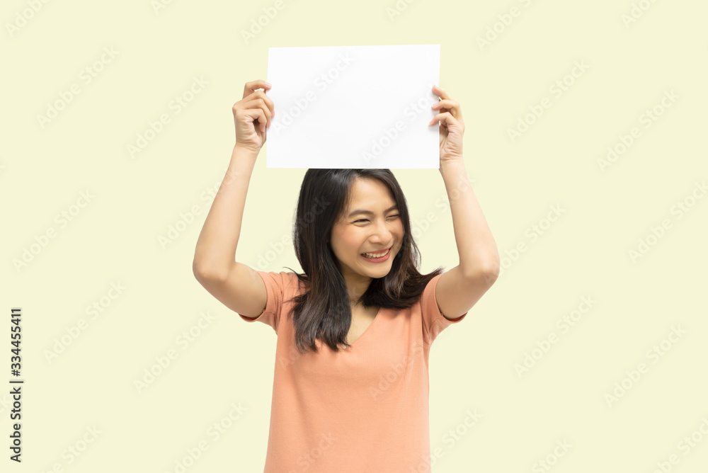 Woman showing blank white paper for copy space Woman showing blank white paper for copy space