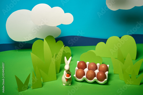 beautiful green spring background with easter rabbits