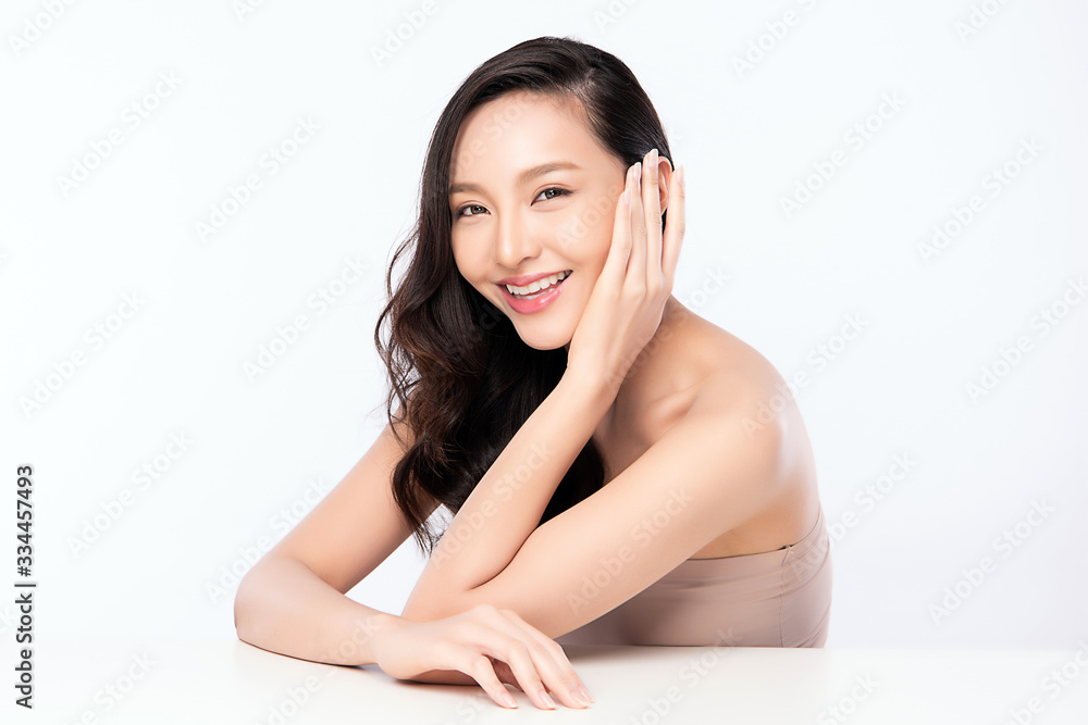 Beautiful Young Asian Woman with Clean Fresh Skin. Face care, Facial treatment, Cosmetology, beauty and healthy skin and cosmetic concept, woman beauty skin isolated on white background Beautiful Young Asian Woman with Clean Fresh Skin. Face care, Facial treatment, Cosmetology, beauty and healthy skin and cosmetic concept, woman beauty skin isolated on white background