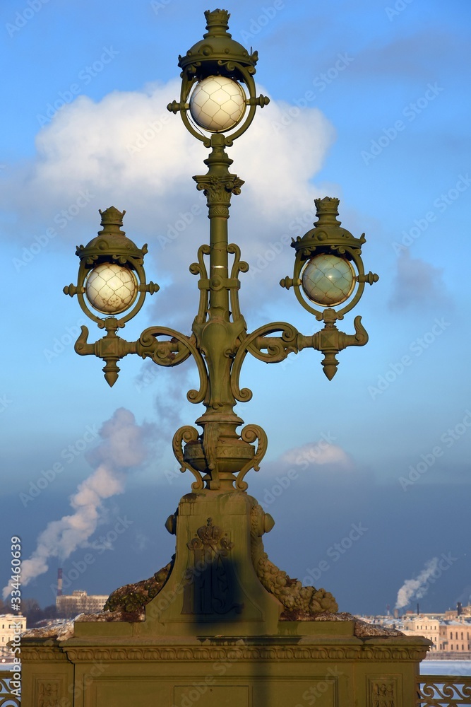 Old street lamp on Troitsky bridge in Saint-Petersburg, Russia Old street lamp on Troitsky bridge in Saint-Petersburg, Russia