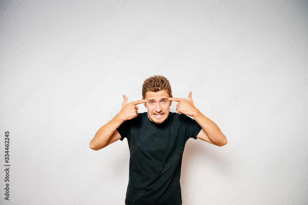 young man with arms raised young man with arms raised