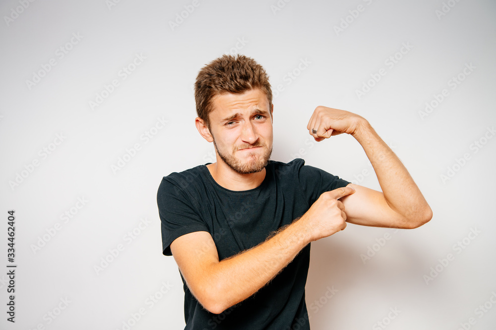 man showing her muscles man showing her muscles