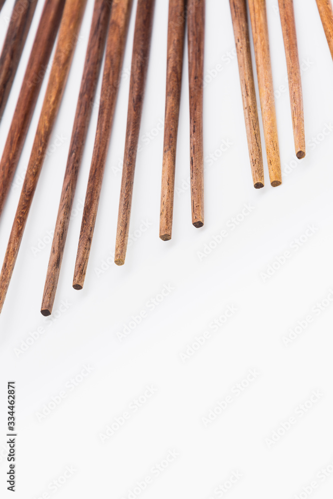 Isolated of Wooden chopsticks arrange on white background Isolated of Wooden chopsticks arrange on white background