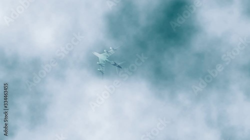 Commercial passenger airplane flying overhead on sunny day. UltraHD stock footage.