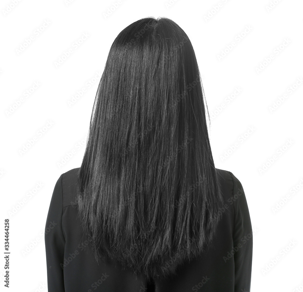 Naklejka premium Young Asian woman with beautiful hair on white background