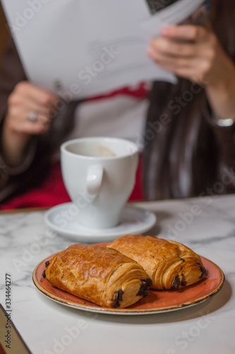 breakfast with coffee and croissant