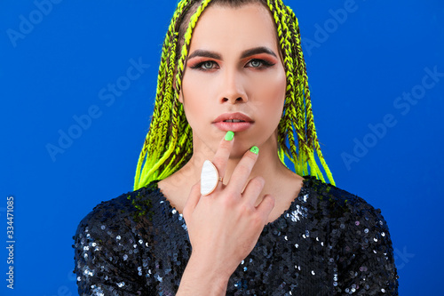 Portrait of young transgend...