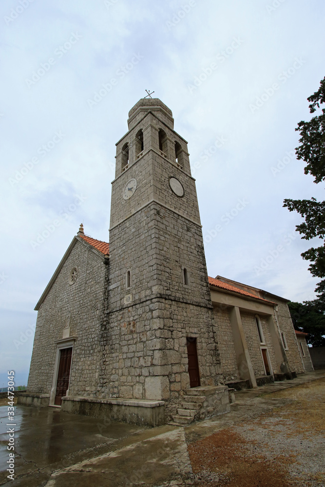 Fototapeta premium Church of St. Anton Opat in Vrisnik village, Hvar island, Croatia