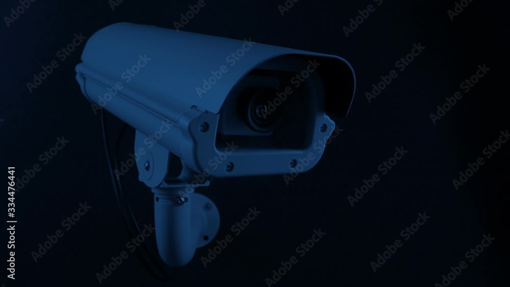 Passing CCTV Camera In The Dark With Red Recording Light Passing CCTV Camera In The Dark With Red Recording Light