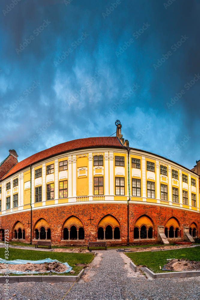 Riga Dome cathedral inner courtyard during sunset time Riga Dome cathedral inner courtyard during sunset time
