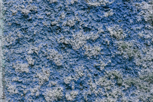 Old blue damaged wall. Color abstract grunge background.