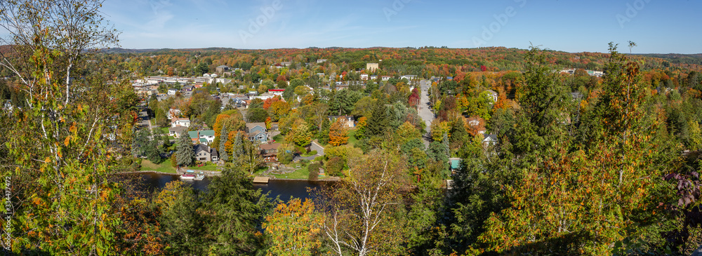 Huntsville aerial view with the city houses and the Muskoka River between Hunters Bay and Fairy Lake